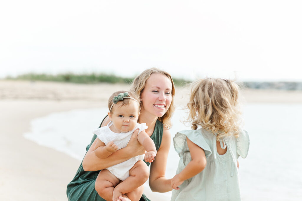 mom and two young daughters, happy on the beach, classic beach family photography