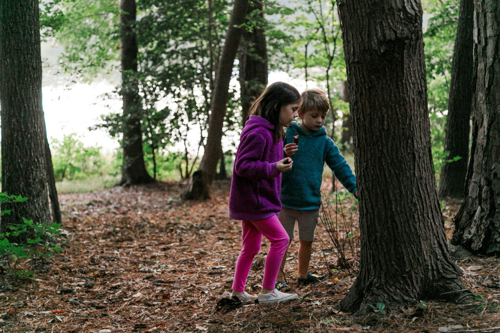 kids exploring the woods, family camping adventure